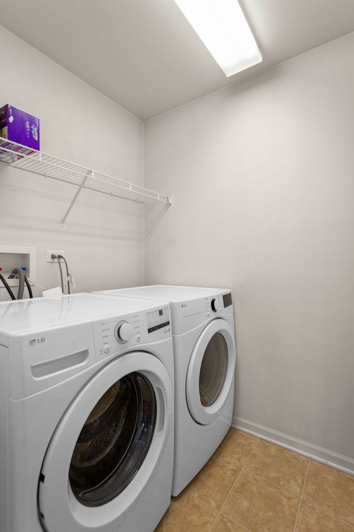 3303 Redbud Drive Lindenhurst, IL 60046 - Photo 9 of 25 a utility room with dryer and washer