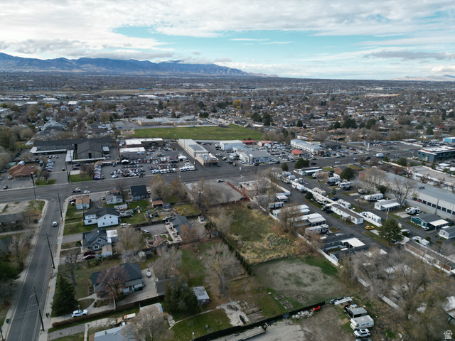 8475 South State Street Sandy, UT 84070 - Photo 14 of 31 Aerial overview of property's location with mountains