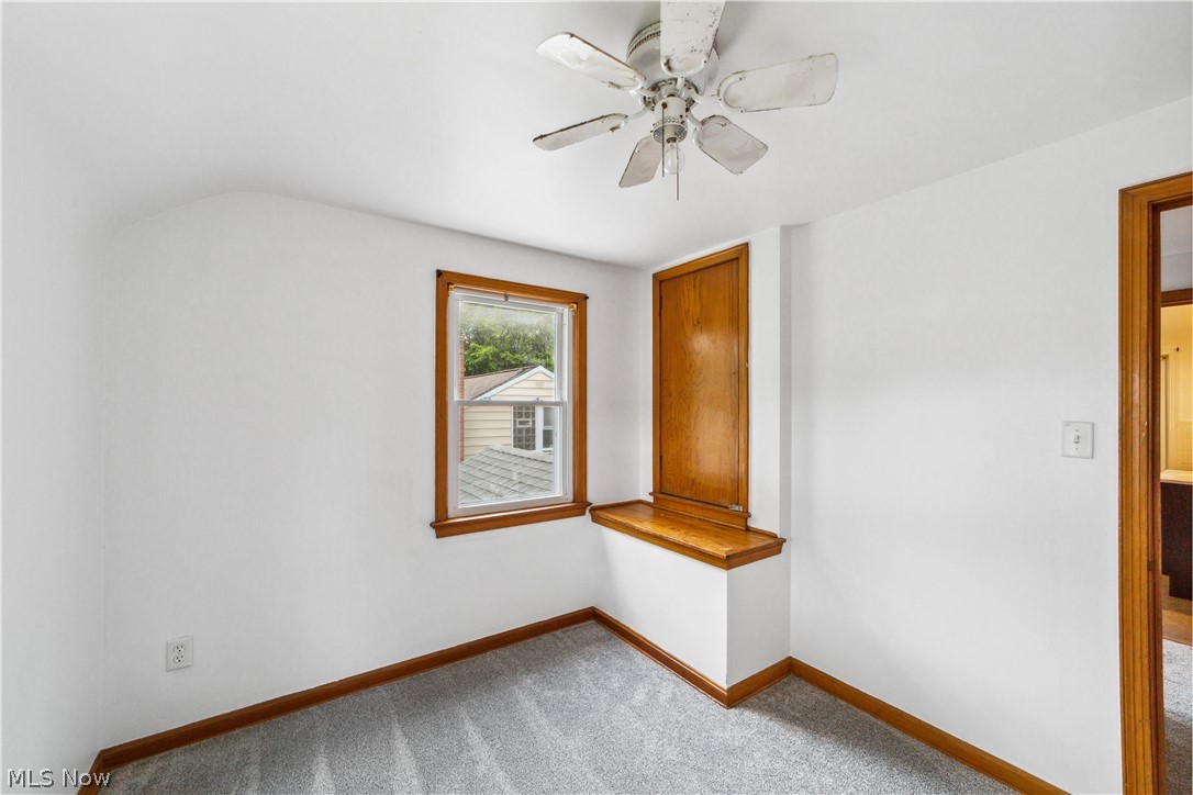 1655 Lyndhurst Road Cleveland, OH 44124 - Photo 21 of 30 Carpeted spare room with ceiling fan