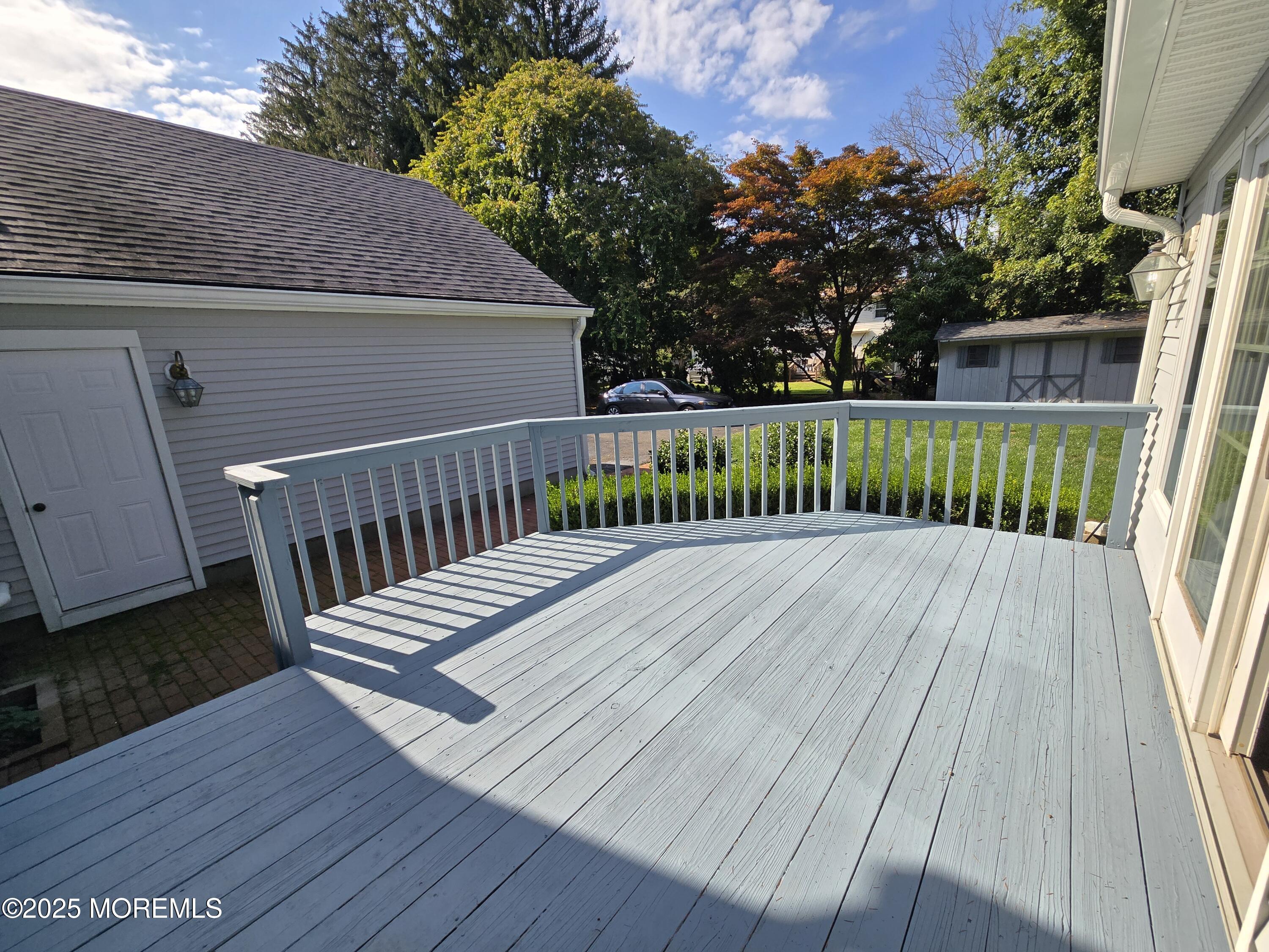 77 Dutch Lane Road Freehold, NJ 07728 - Photo 18 of 50 a view of deck with patio