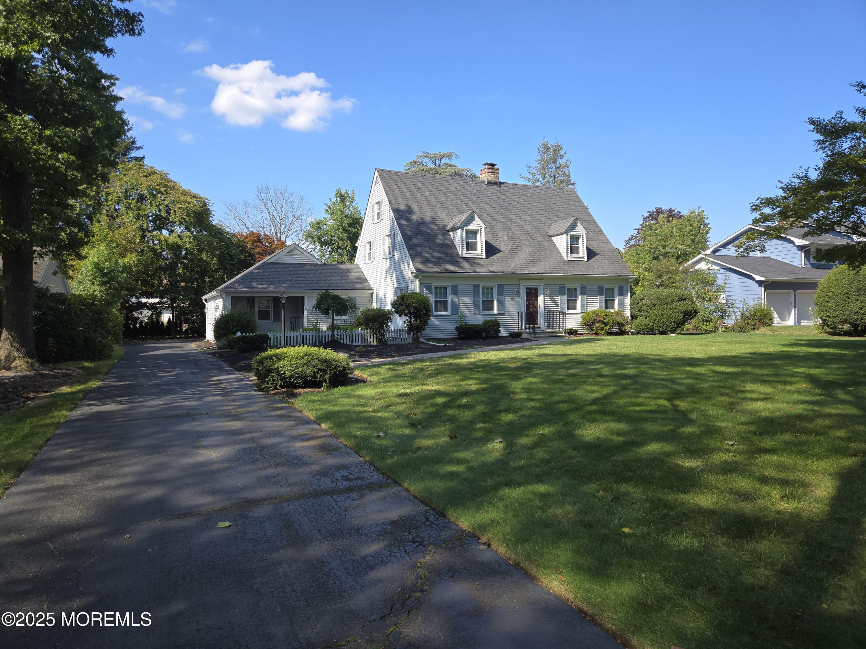 77 Dutch Lane Road Freehold, NJ 07728 - Photo 2 of 50 a front view of a house with garden