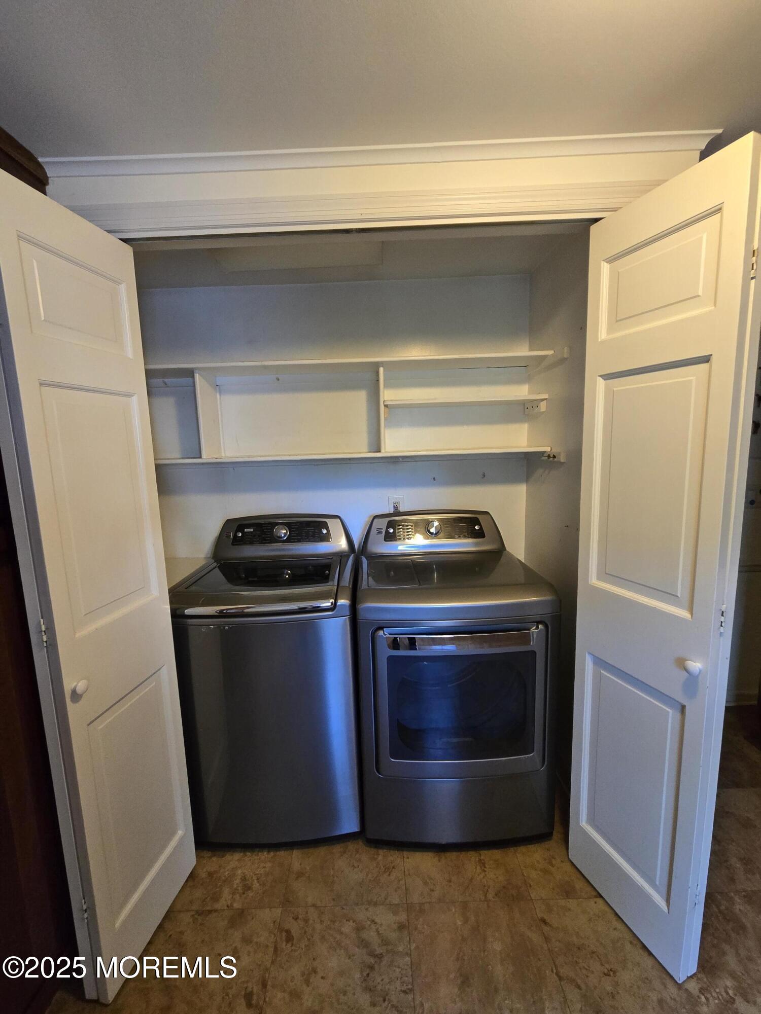 77 Dutch Lane Road Freehold, NJ 07728 - Photo 24 of 50 a utility room with washer and dryer