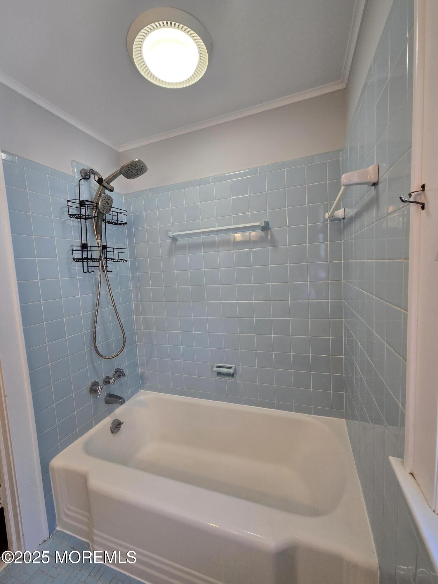 77 Dutch Lane Road Freehold, NJ 07728 - Photo 35 of 50 a bathroom with a bath tub