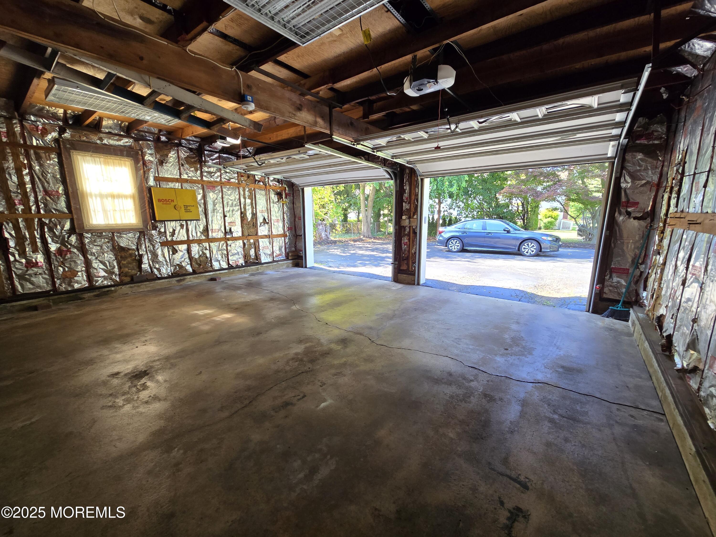 77 Dutch Lane Road Freehold, NJ 07728 - Photo 46 of 50 a view of empty room with wooden floor