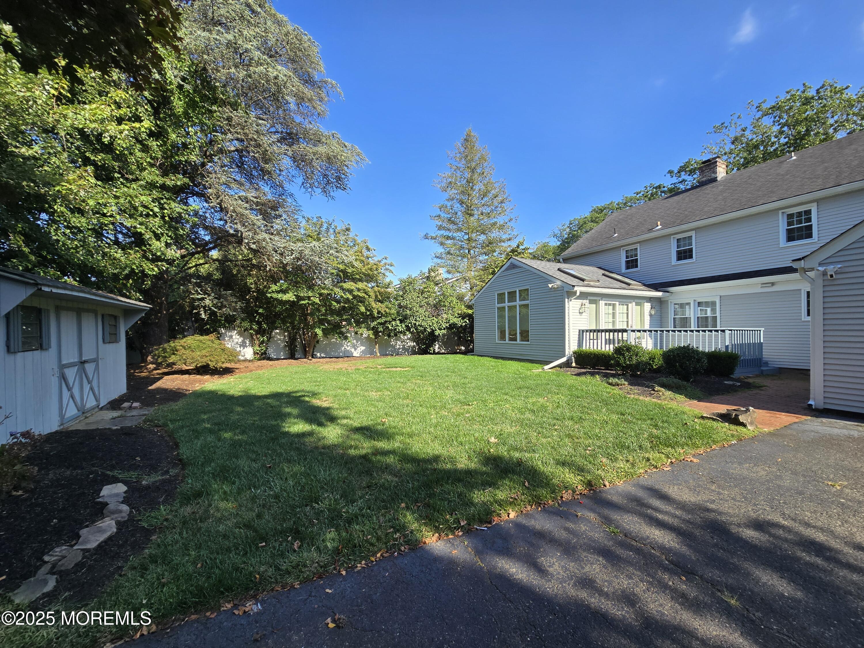 77 Dutch Lane Road Freehold, NJ 07728 - Photo 47 of 50 a view of a yard in front of house