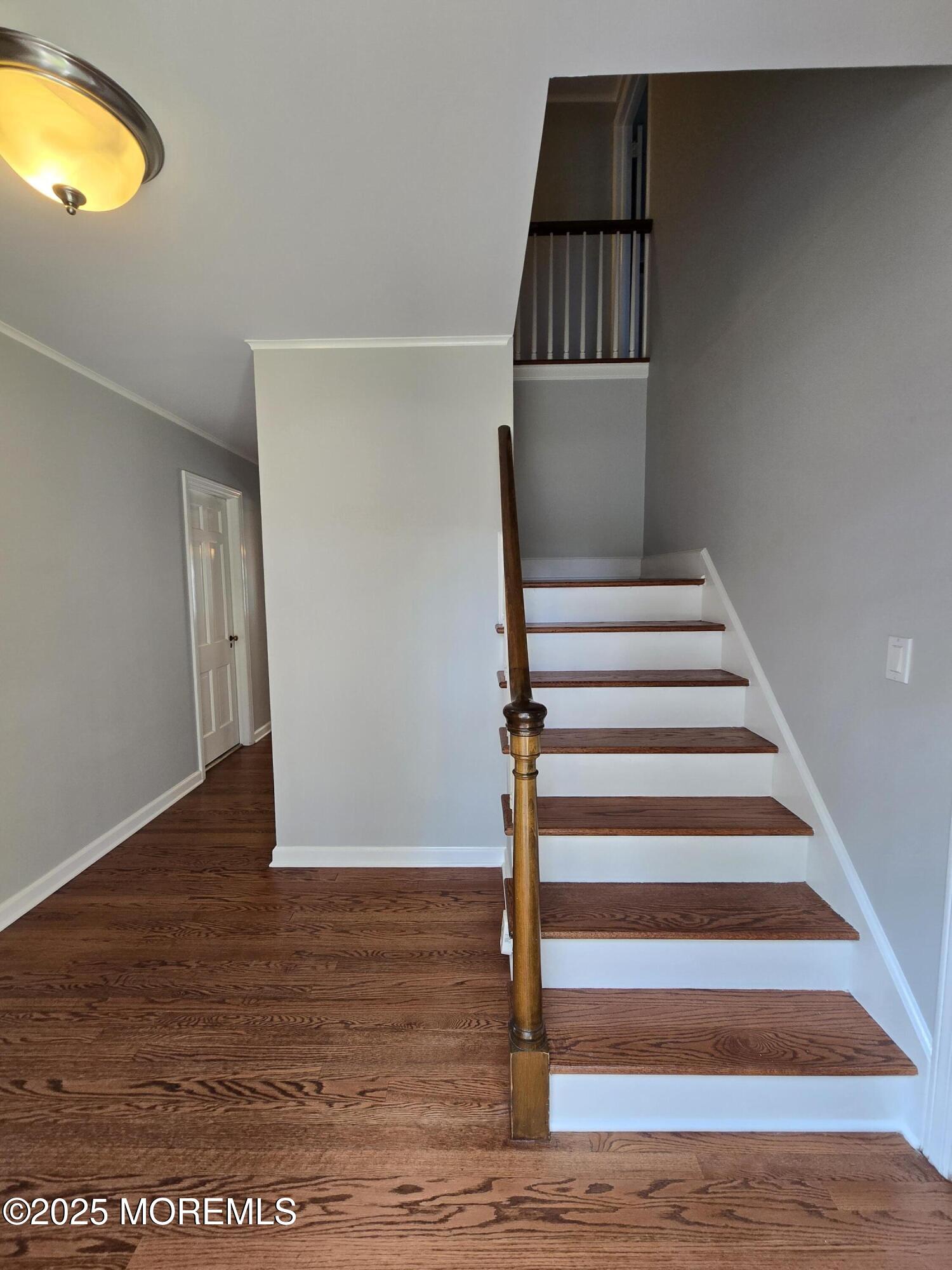 77 Dutch Lane Road Freehold, NJ 07728 - Photo 6 of 50 a view of entryway with wooden floor
