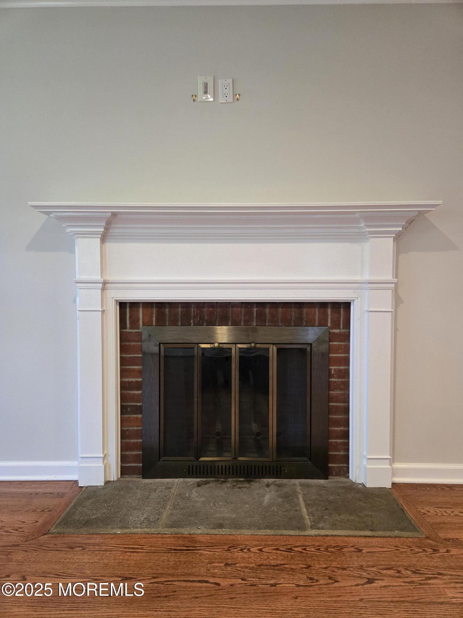 77 Dutch Lane Road Freehold, NJ 07728 - Photo 9 of 50 a view of a living room with a fireplace