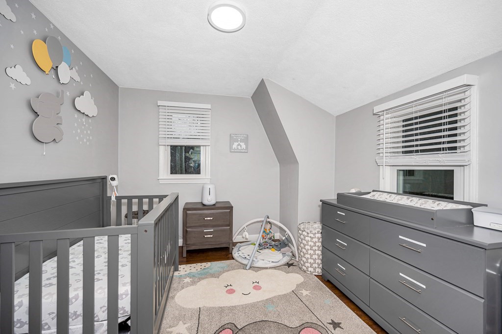 76 Maplewood Drive Townsend, MA 01469 - Photo 20 of 31 a room with furniture a flat screen tv and a window