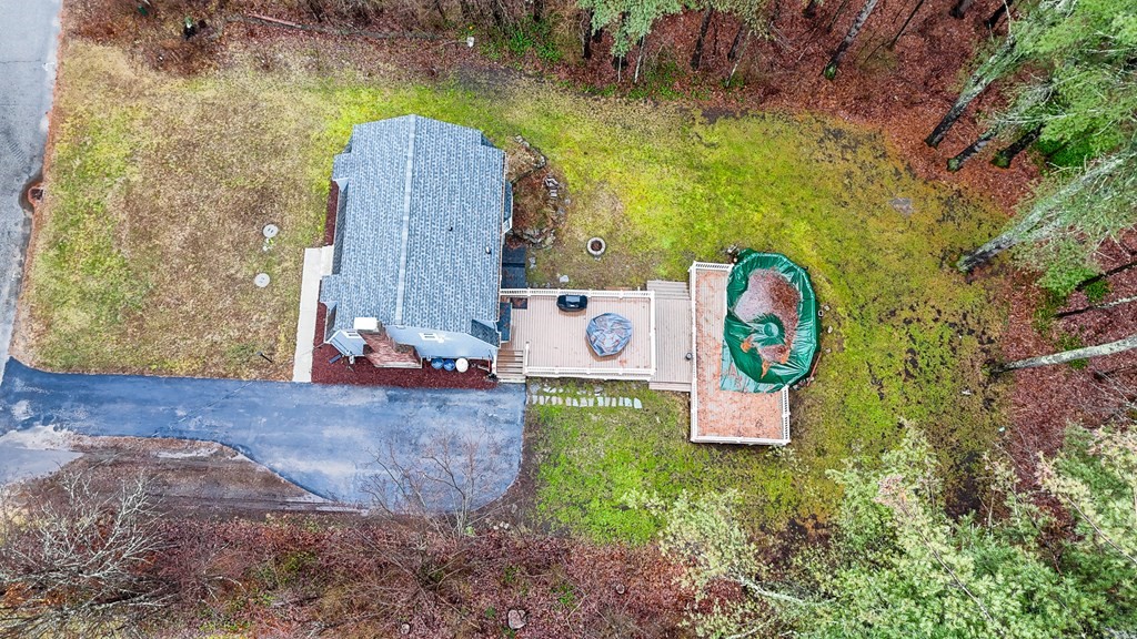 76 Maplewood Drive Townsend, MA 01469 - Photo 2 of 31 a wooden bench sitting in front of a road