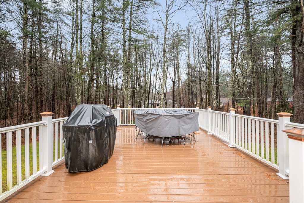 76 Maplewood Drive Townsend, MA 01469 - Photo 29 of 31 a view of a swimming pool with a patio and wooden fence