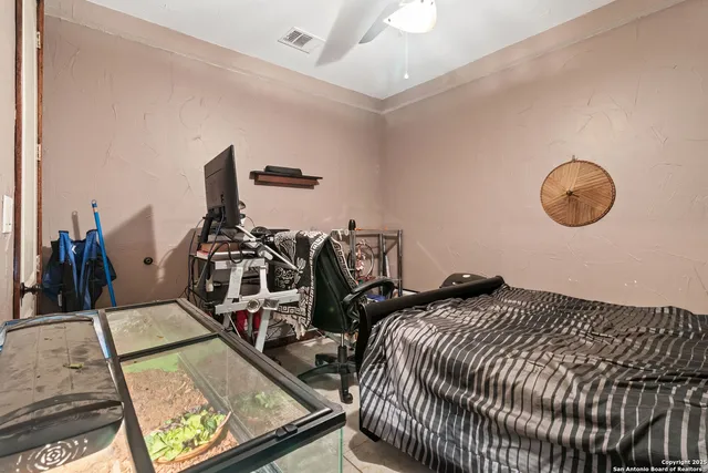 a bed room with two beds and a rug