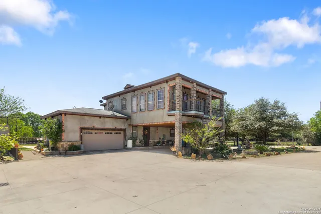a view of a house with a garden