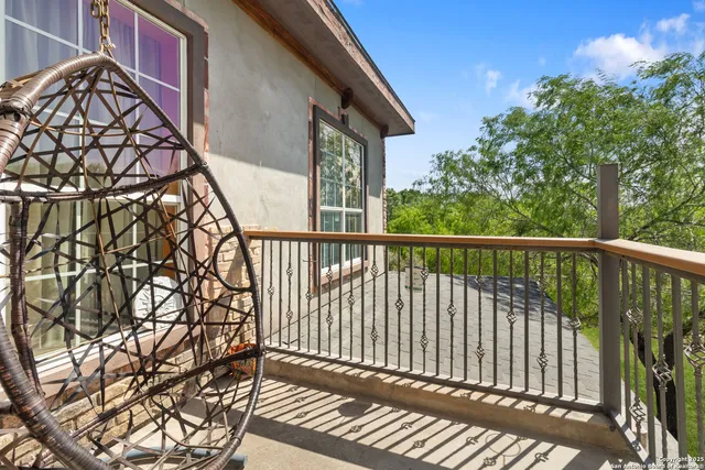 a view of a balcony with an outdoor space