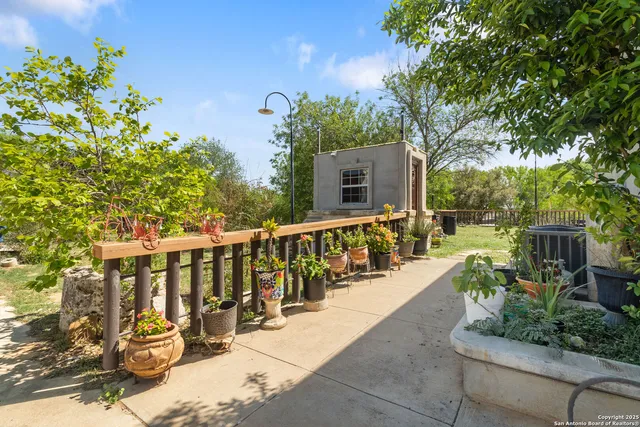 a view of a chairs and tables in the patio