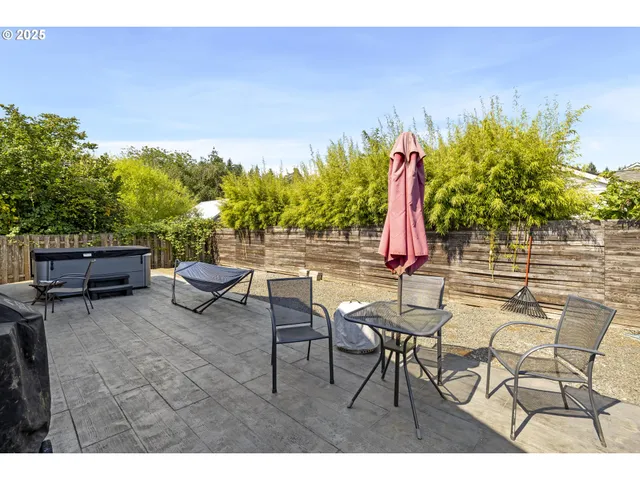 a view of a dining room with furniture and a table