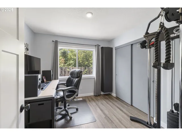 a view of a chair and table in a room