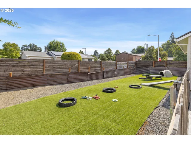 a view of a swimming pool with a lounge chairs