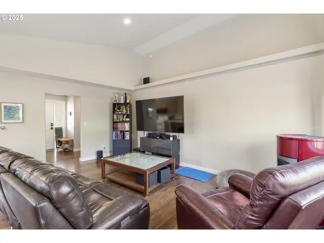a living room with furniture and a table