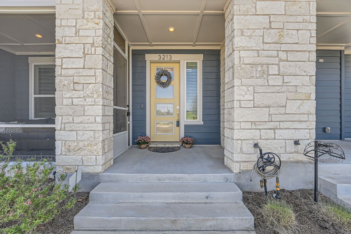 3213 Zach Scott Street Austin, TX 78723 - Photo 2 of 28 Entrance to property featuring stone siding