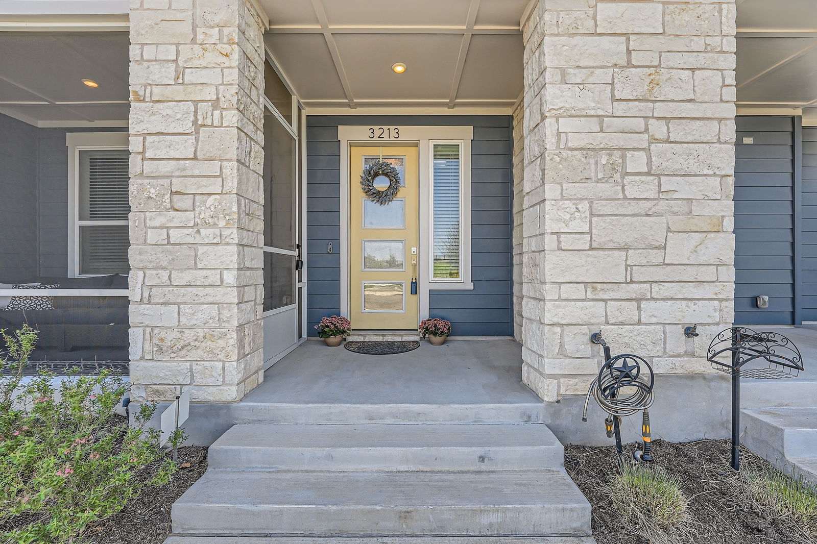 3213 Zach Scott Street Austin, TX 78723 - Photo 2 of 28 Entrance to property featuring stone siding