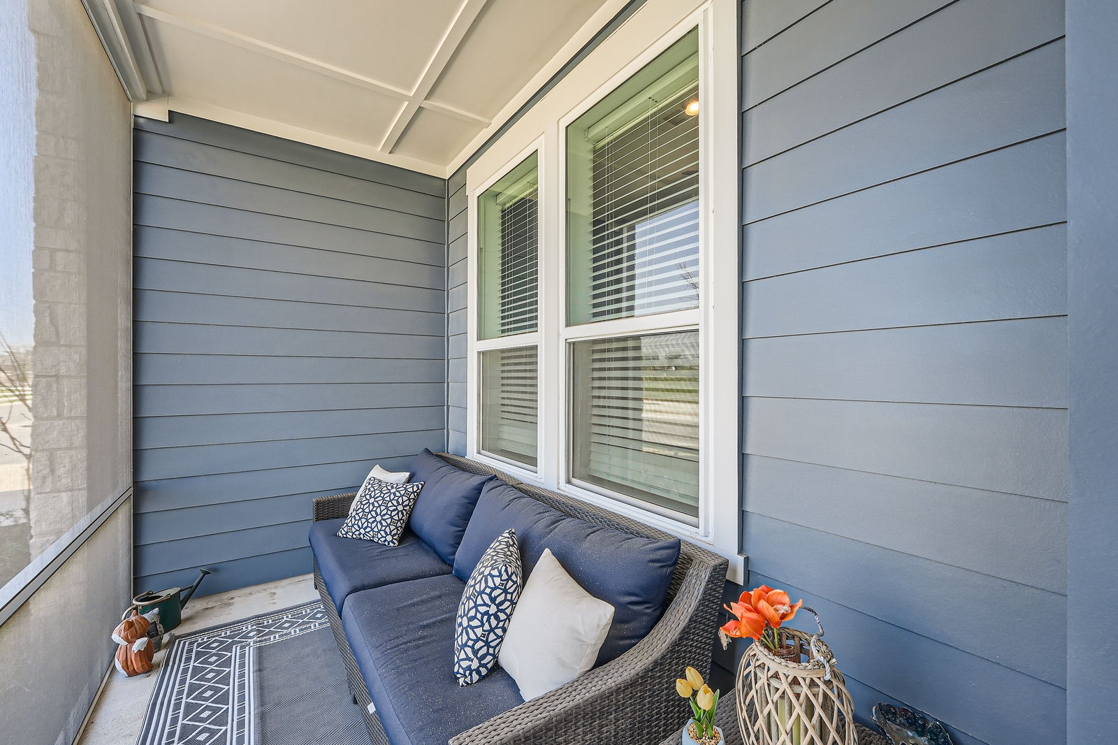 3213 Zach Scott Street Austin, TX 78723 - Photo 3 of 28 Balcony featuring an outdoor hangout area and covered porch