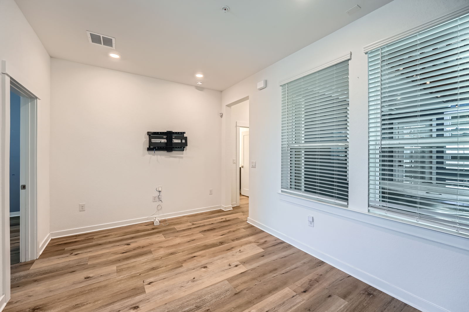 3213 Zach Scott Street Austin, TX 78723 - Photo 7 of 28 Downstairs living, bonus, play or office room.