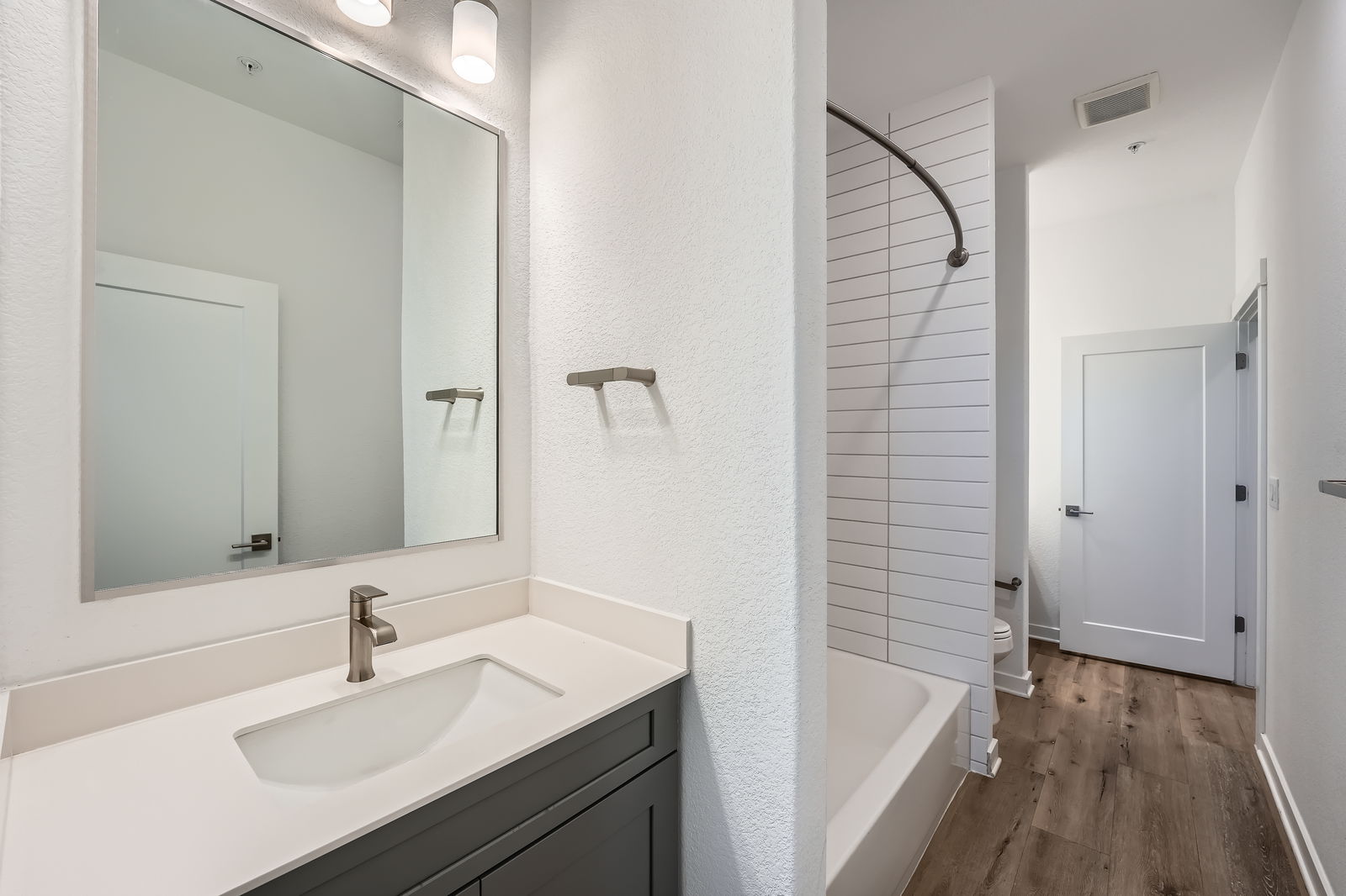 3213 Zach Scott Street Austin, TX 78723 - Photo 10 of 28 Full Jack and Jill bathroom.