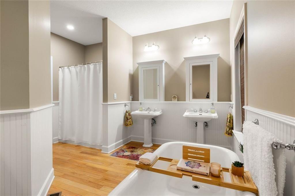 704 Riverbend Road Blairsville, GA 30512 - Photo 50 of 89 a bathroom with a sink and mirror