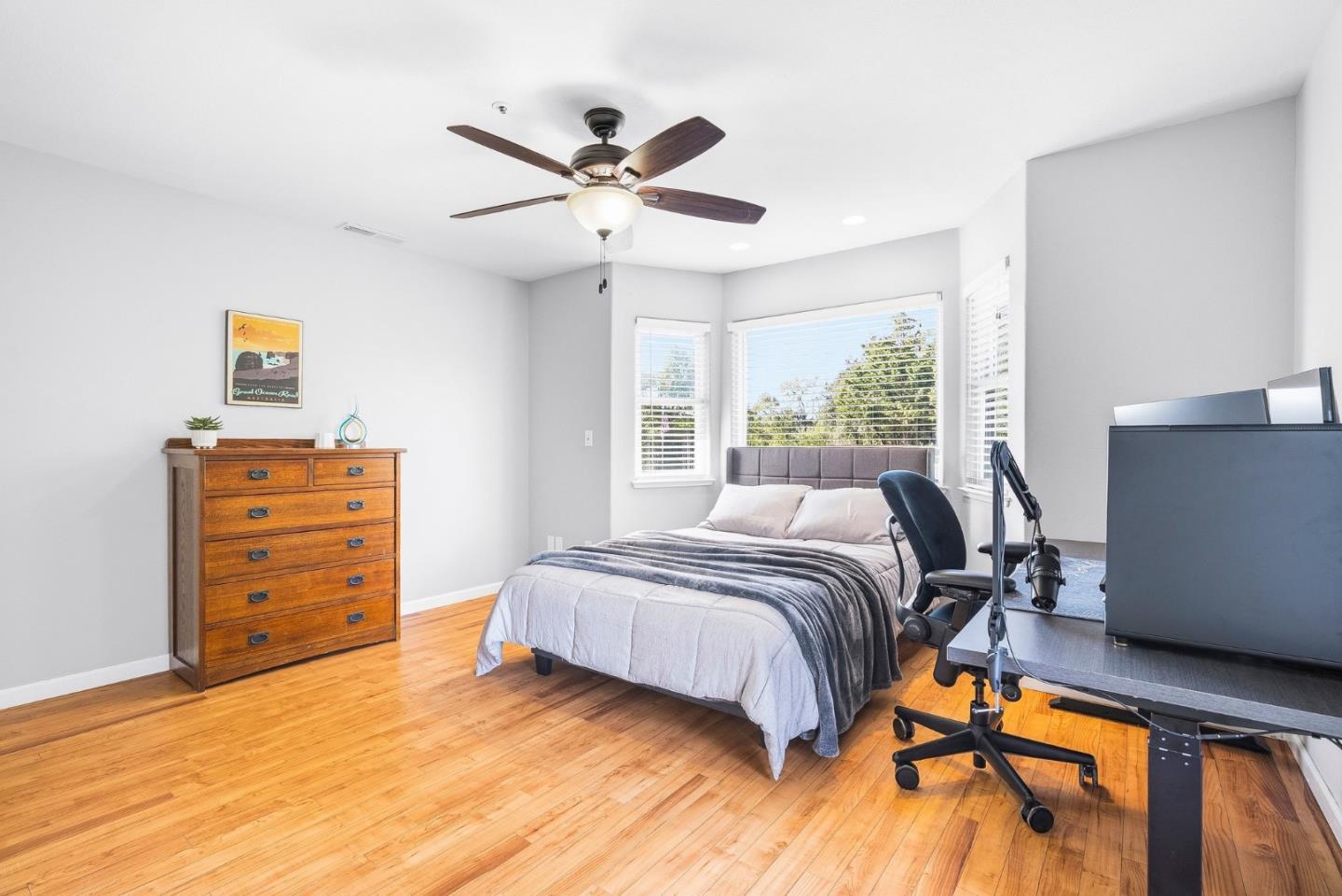 2500 Nelson Road Scotts Valley, CA 95066 - Photo 32 of 77 a bedroom with a bed and wooden floor