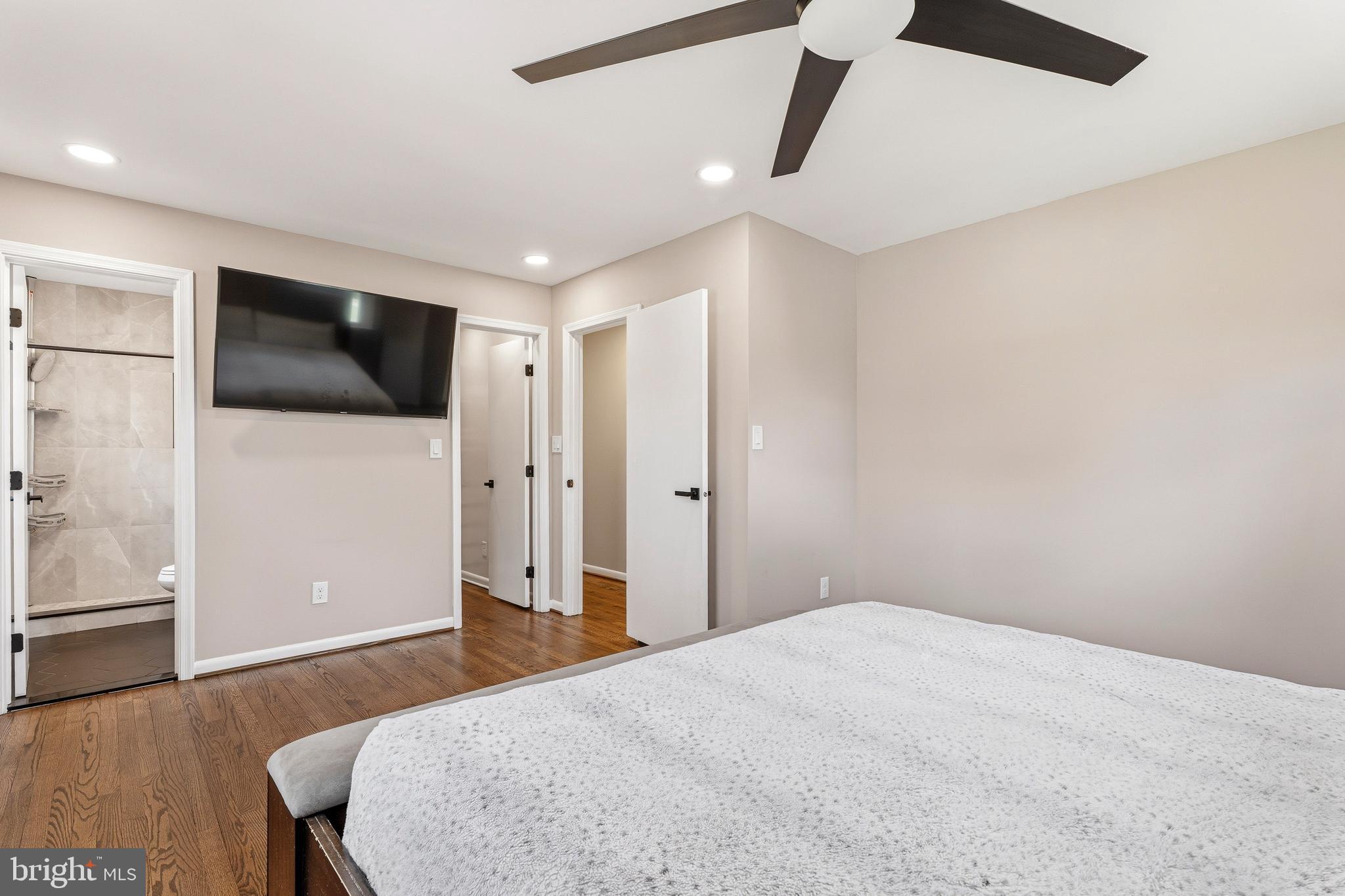1211 Grafton Shop Road Bel Air, MD 21014 - Photo 23 of 42 a bedroom with a bed and a flat screen tv