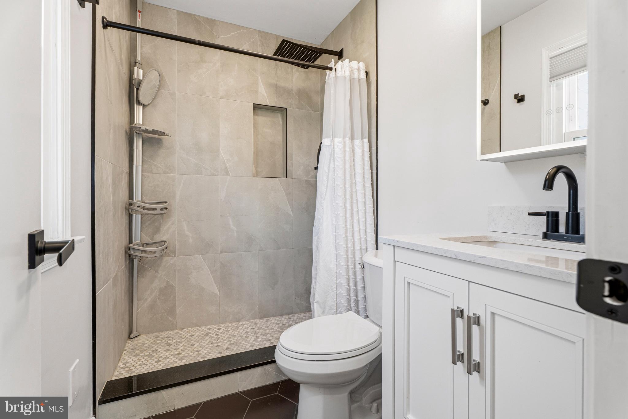 1211 Grafton Shop Road Bel Air, MD 21014 - Photo 25 of 42 a bathroom with a sink toilet and shower
