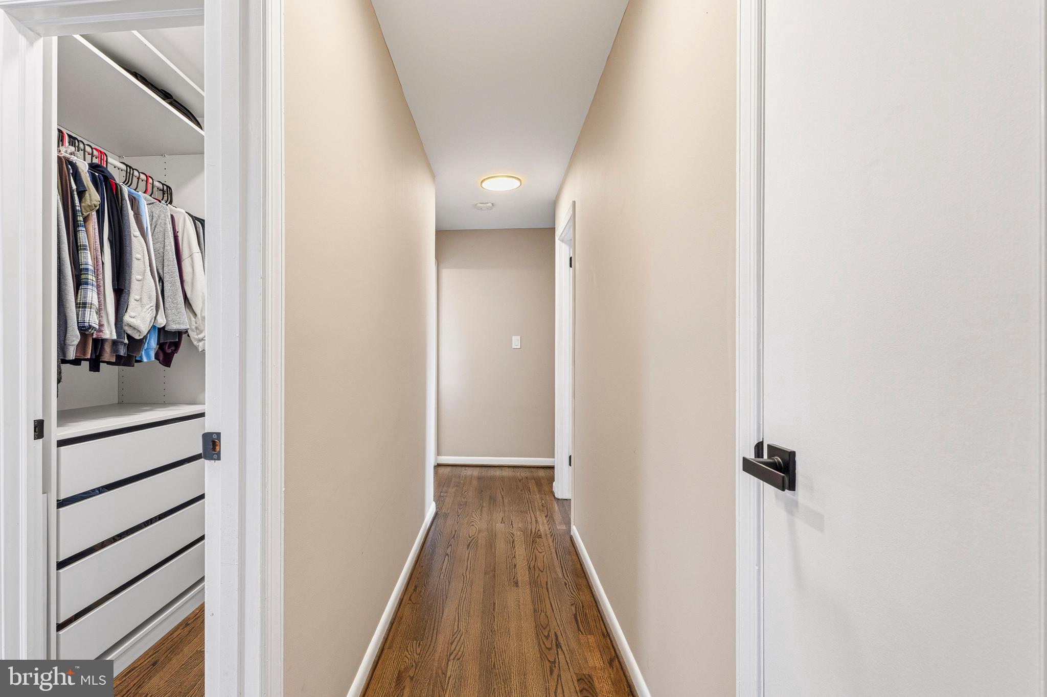 1211 Grafton Shop Road Bel Air, MD 21014 - Photo 29 of 42 a view of a hallway with wooden floor and staircase