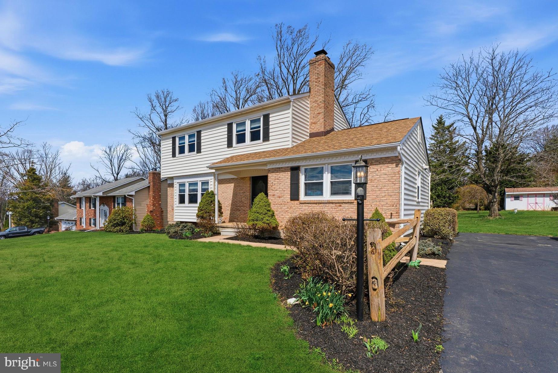 1211 Grafton Shop Road Bel Air, MD 21014 - Photo 3 of 42 a front view of a house with garden