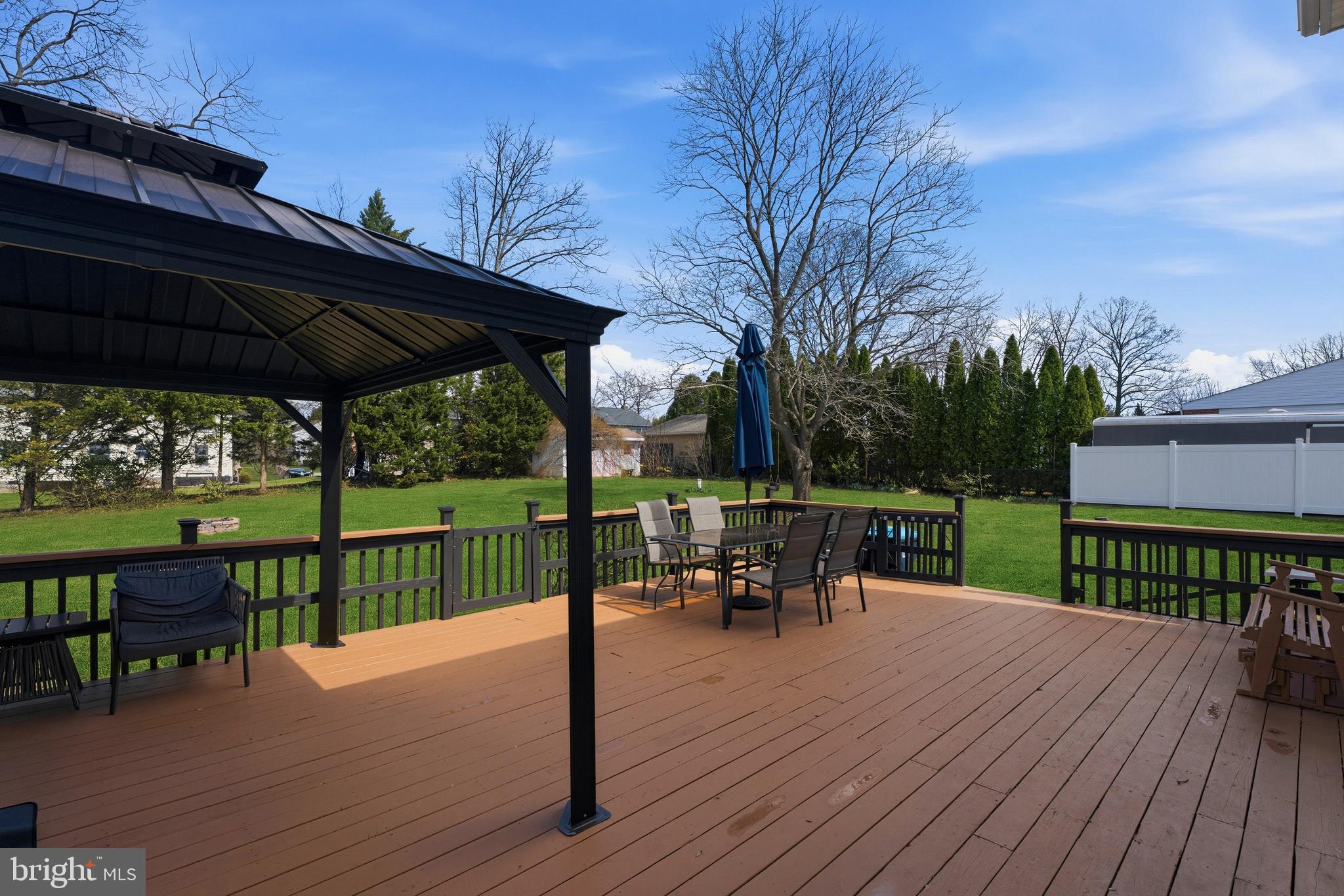 1211 Grafton Shop Road Bel Air, MD 21014 - Photo 38 of 42 a view of a table and chairs on the roof deck