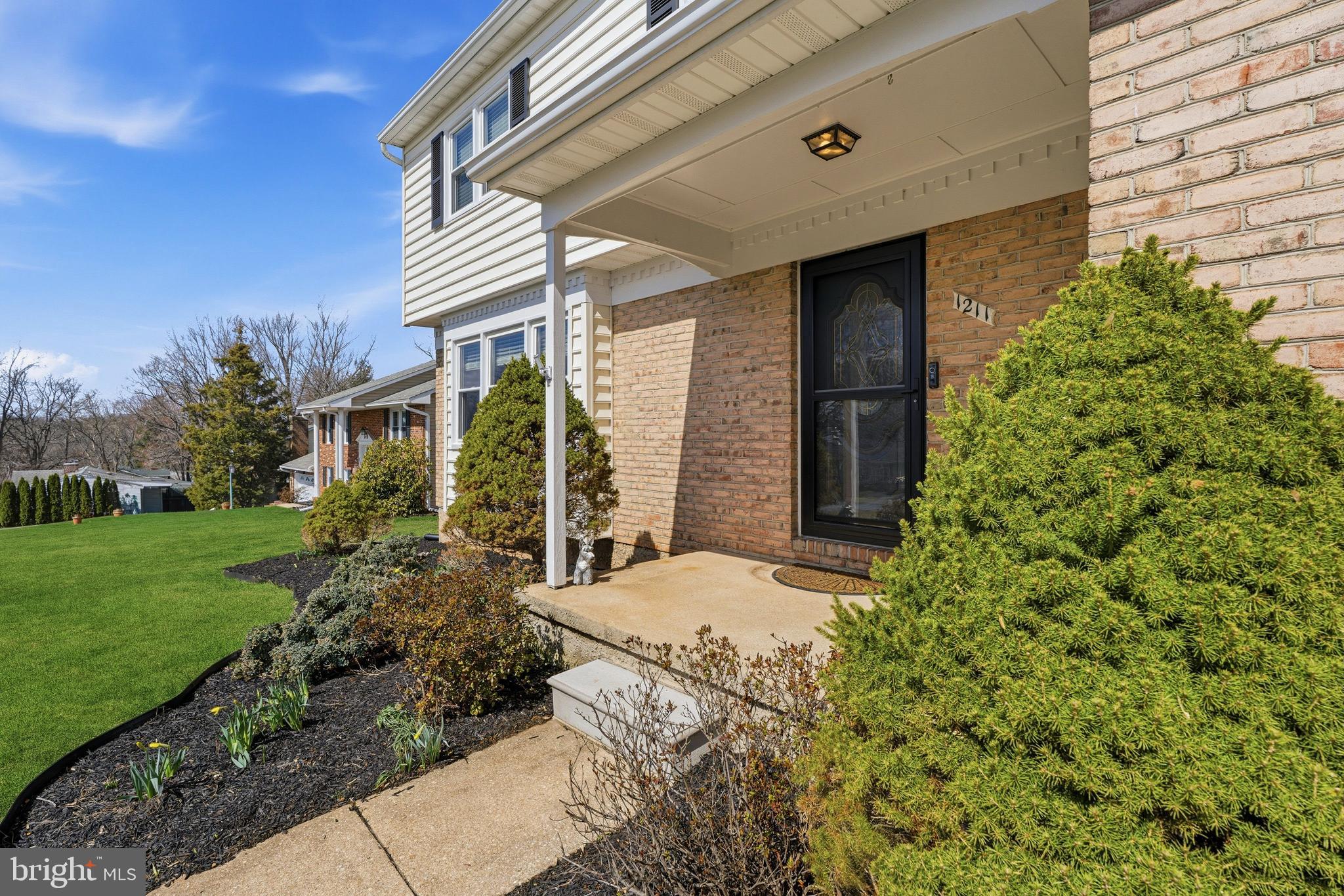1211 Grafton Shop Road Bel Air, MD 21014 - Photo 4 of 42 a front view of a house with garden