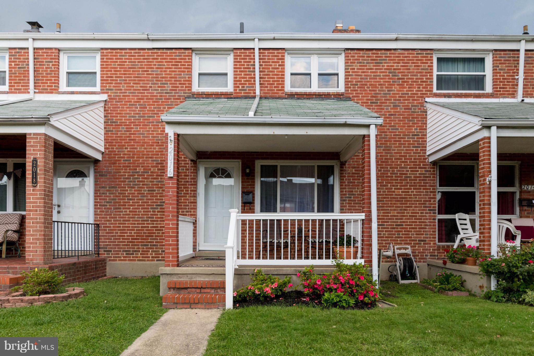 2016 Ormand Road Baltimore, MD 21222 - Photo 1 of 26 a front view of a house with garden