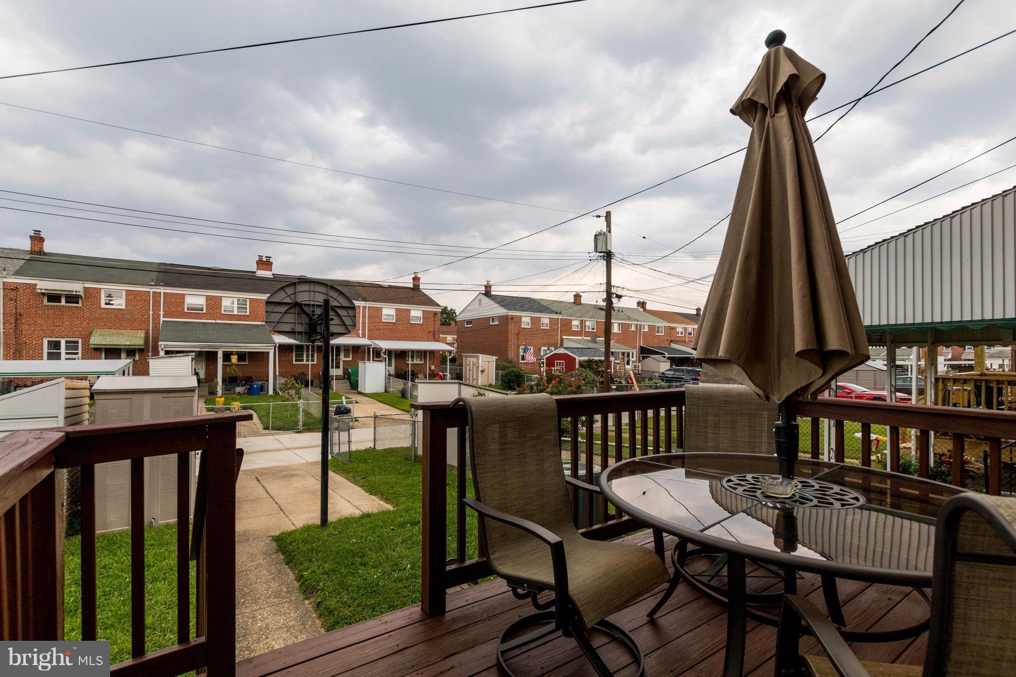 2016 Ormand Road Baltimore, MD 21222 - Photo 4 of 26 a view of a chairs and table in the balcony