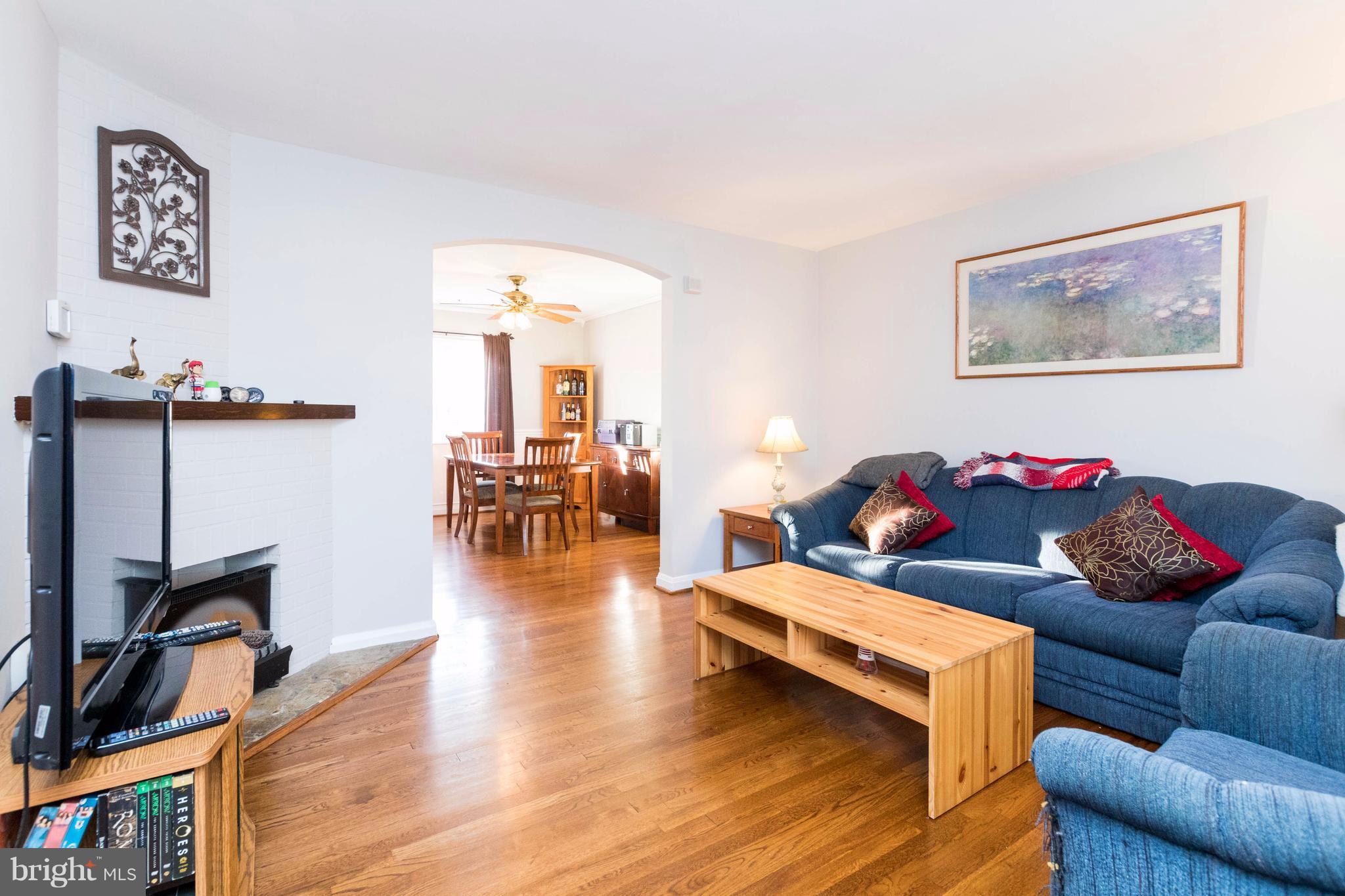 2016 Ormand Road Baltimore, MD 21222 - Photo 5 of 26 a living room with furniture and wooden floor
