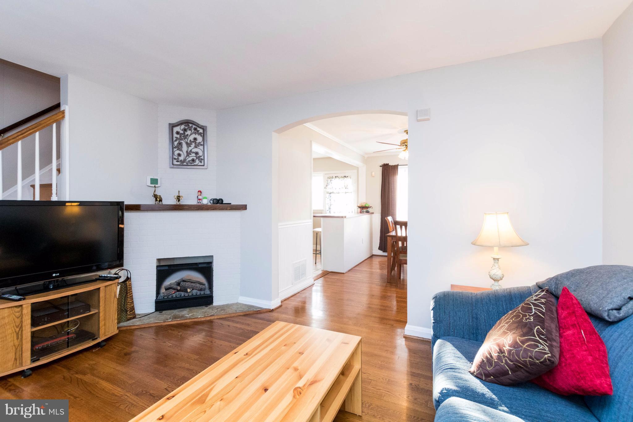 2016 Ormand Road Baltimore, MD 21222 - Photo 8 of 26 a living room with furniture and a flat screen tv
