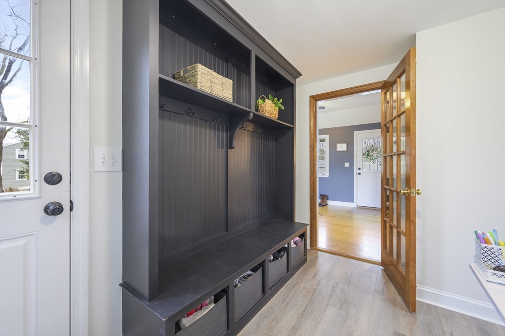 31 Indian Trail Hanson, MA 02341 - Photo 14 of 41 a view of a hallway with wooden floor and staircase