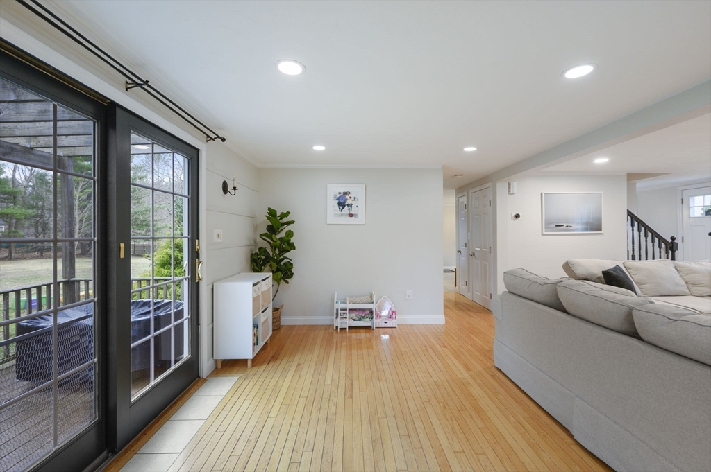 31 Indian Trail Hanson, MA 02341 - Photo 18 of 41 a living room with furniture and a large window