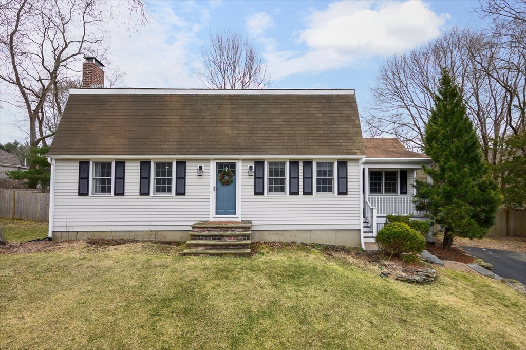 31 Indian Trail Hanson, MA 02341 - Photo 2 of 41 a front view of a house with a yard