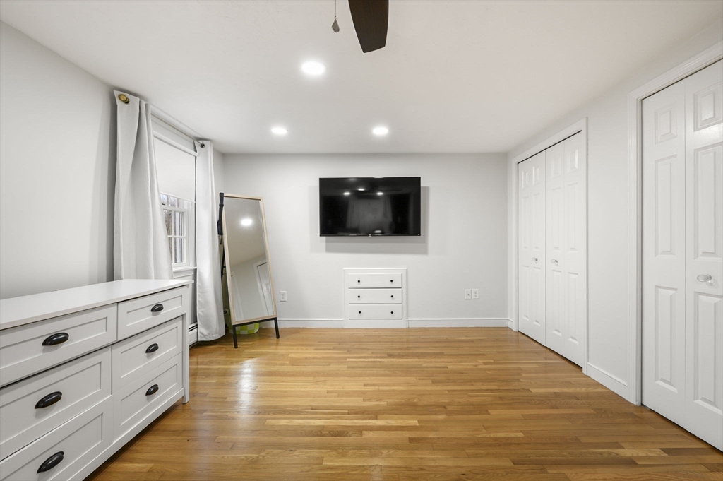 31 Indian Trail Hanson, MA 02341 - Photo 23 of 41 a view of a livingroom with wooden floor