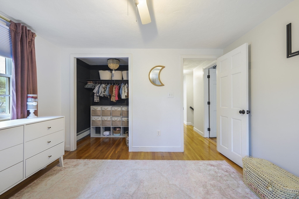 31 Indian Trail Hanson, MA 02341 - Photo 27 of 41 a view of a bedroom with cabinet mirror and window