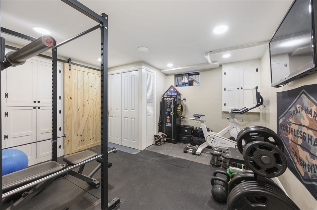 31 Indian Trail Hanson, MA 02341 - Photo 30 of 41 a view of a room with gym equipment