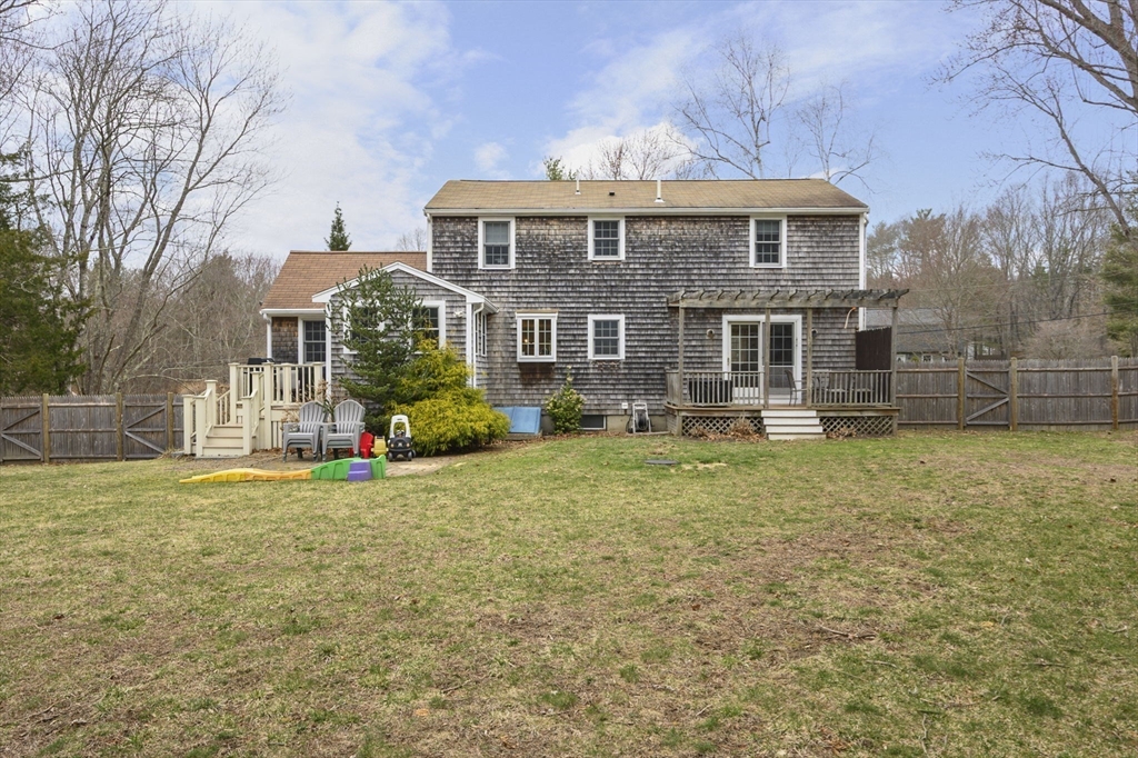 31 Indian Trail Hanson, MA 02341 - Photo 37 of 41 a front view of a house with a garden