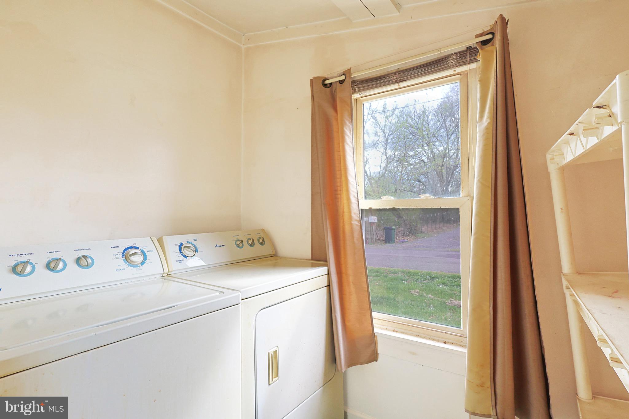 715 Charles Street Romney, WV 26757 - Photo 19 of 44 a utility room with dryer and washer