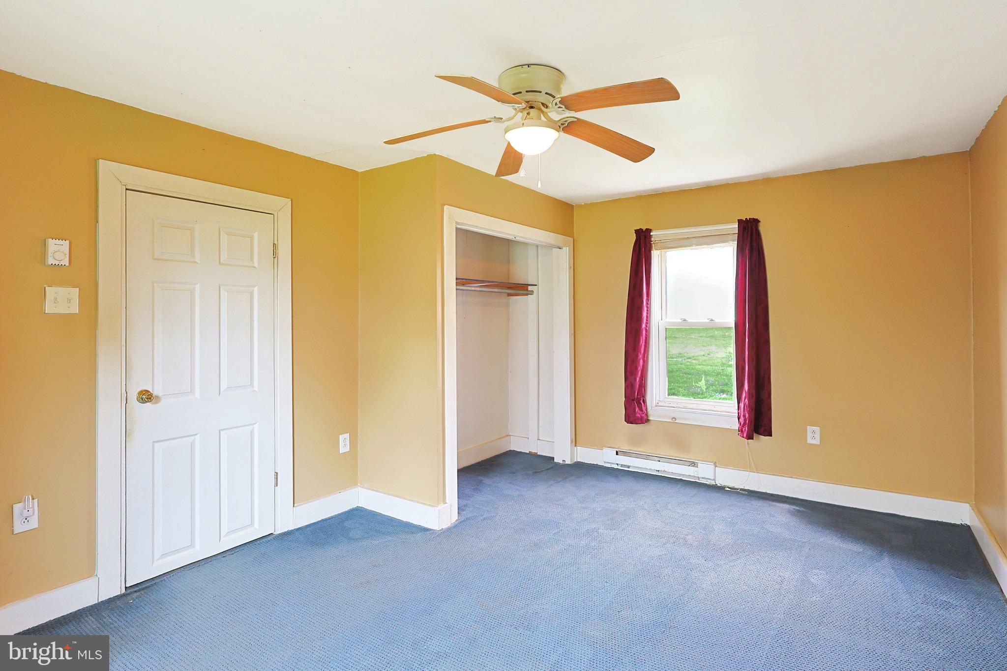 715 Charles Street Romney, WV 26757 - Photo 20 of 44 a view of an empty room with a window