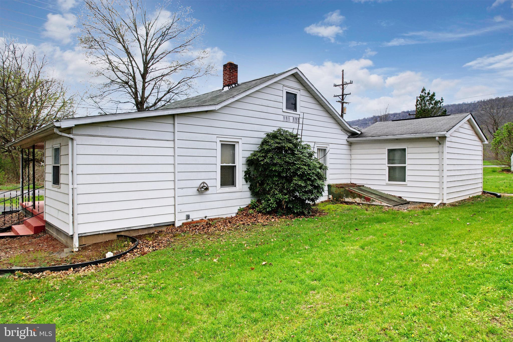 715 Charles Street Romney, WV 26757 - Photo 44 of 44 a front view of a house with a yard