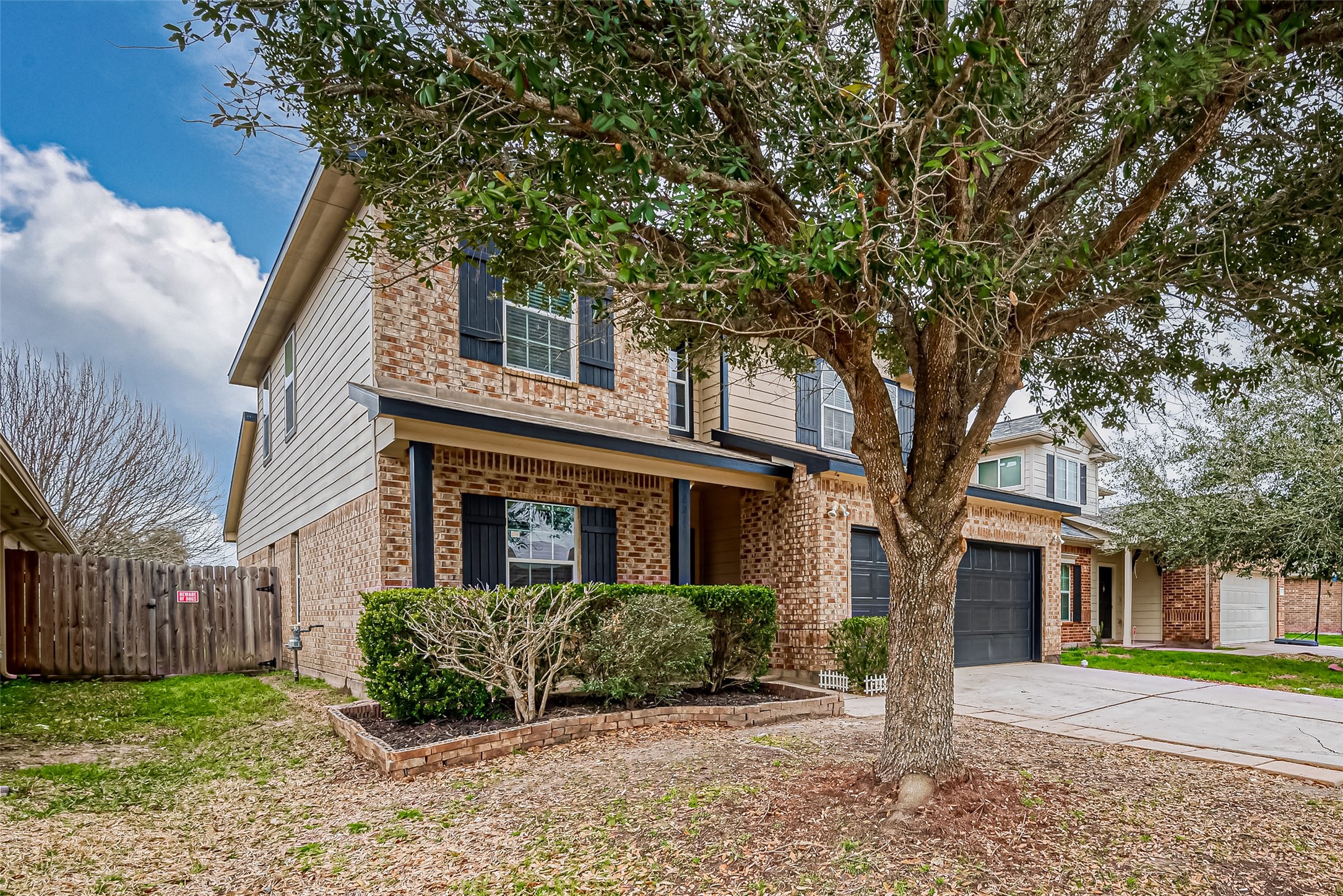 6211 Borage Street Crosby, TX 77532 - Photo 3 of 43 a front view of a house with a yard